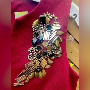 Beautiful intricate detailing almost steampunk maroon size 2